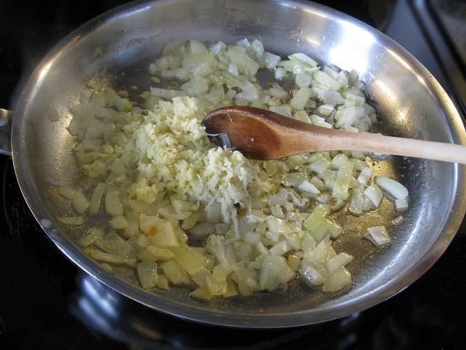 Add the grated gingerroot and minced garlic