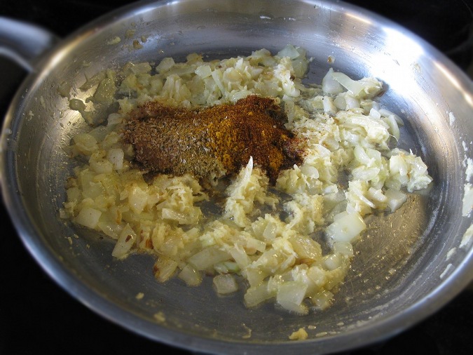 Add spices to the butter chicken