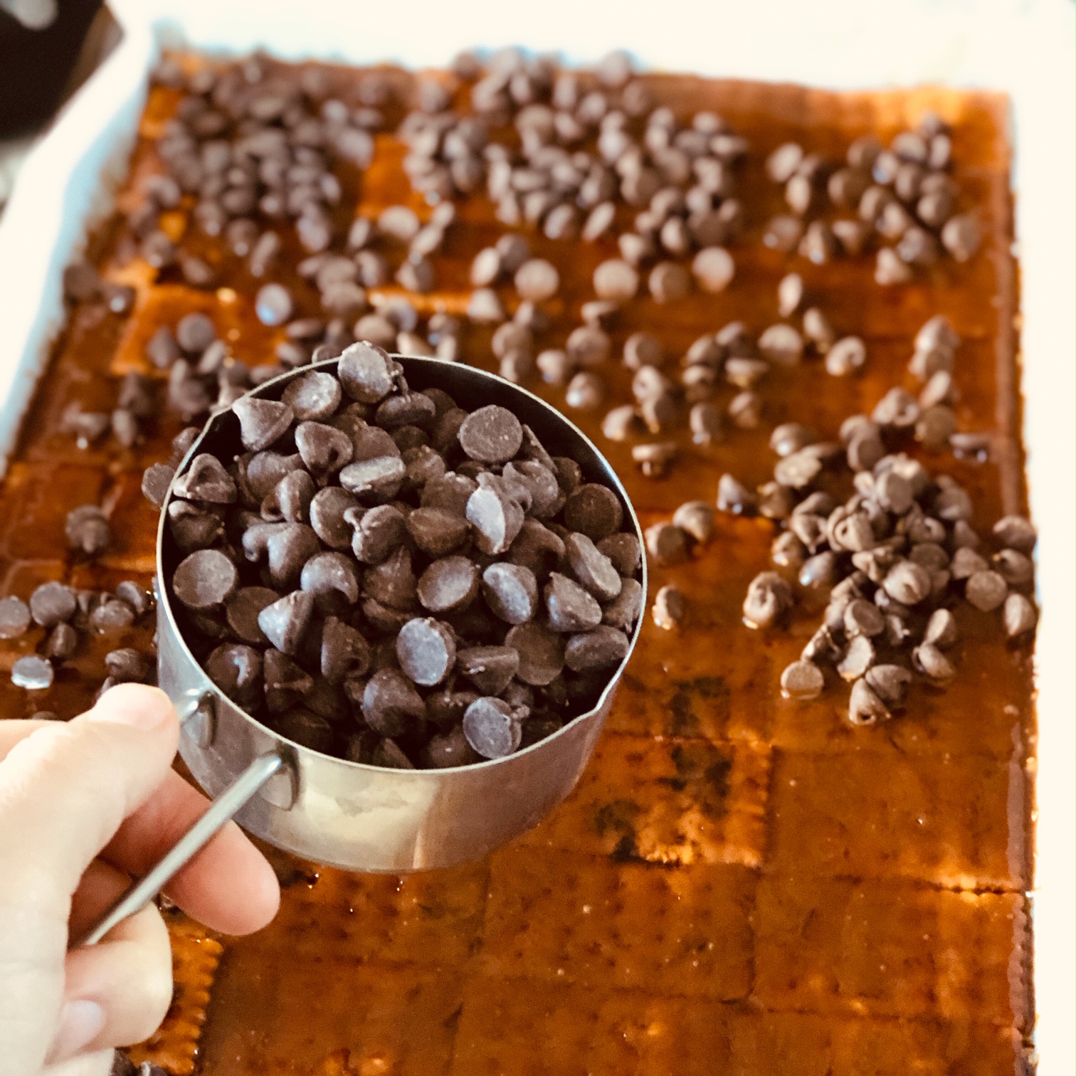 Christmas Crack - add chocolate chips on toffee layer