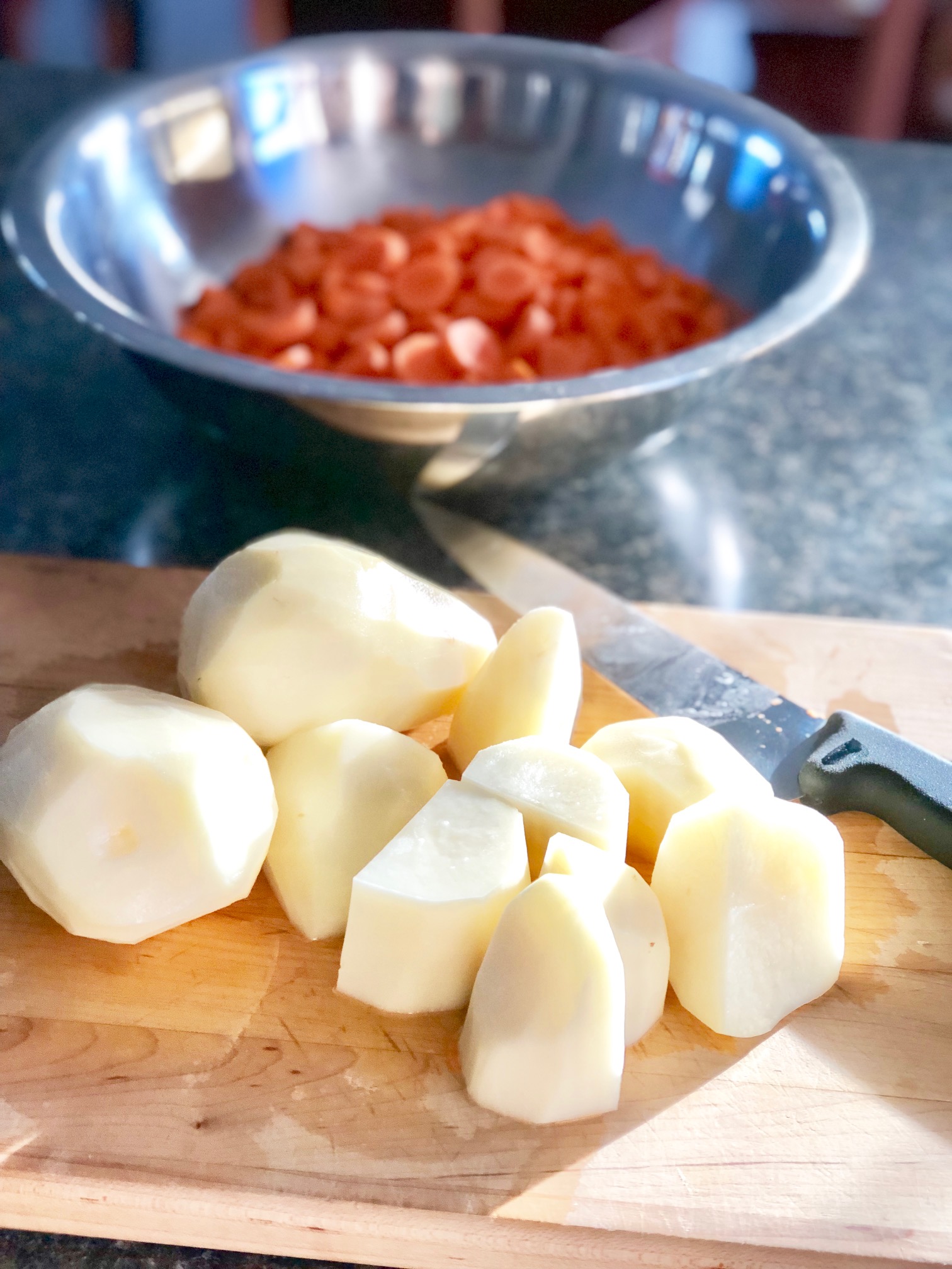 Peel and half some potatos - Russets are my favorite