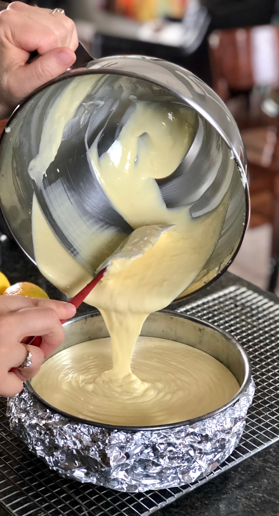 Pour lemon cheesecake batter into springform pan