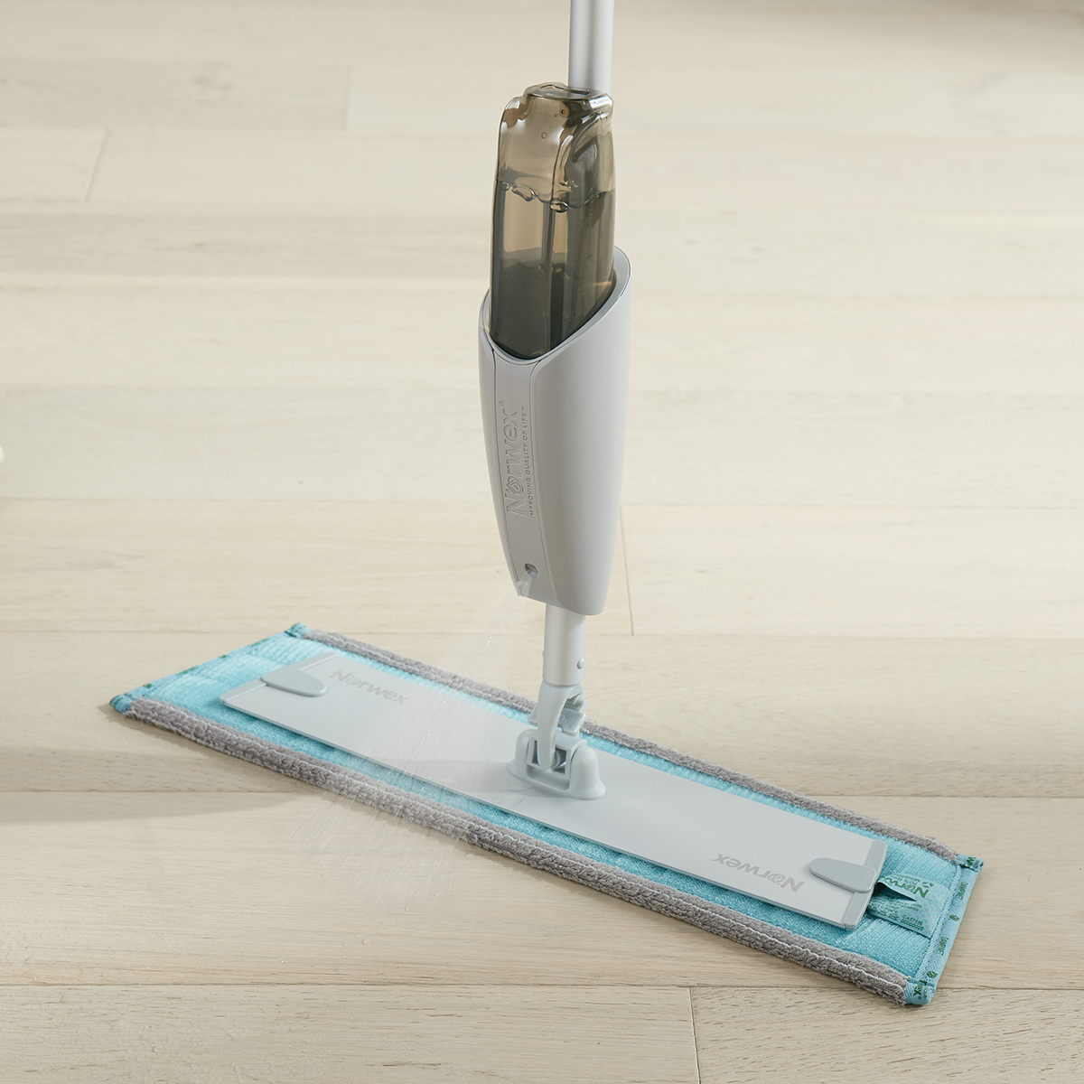 https://healthyhomecleaning.com/wp-content/uploads/sites/67/2022/03/Spray_Mop_Attach_spraying_enviro_Lg-2846x2846-1.png