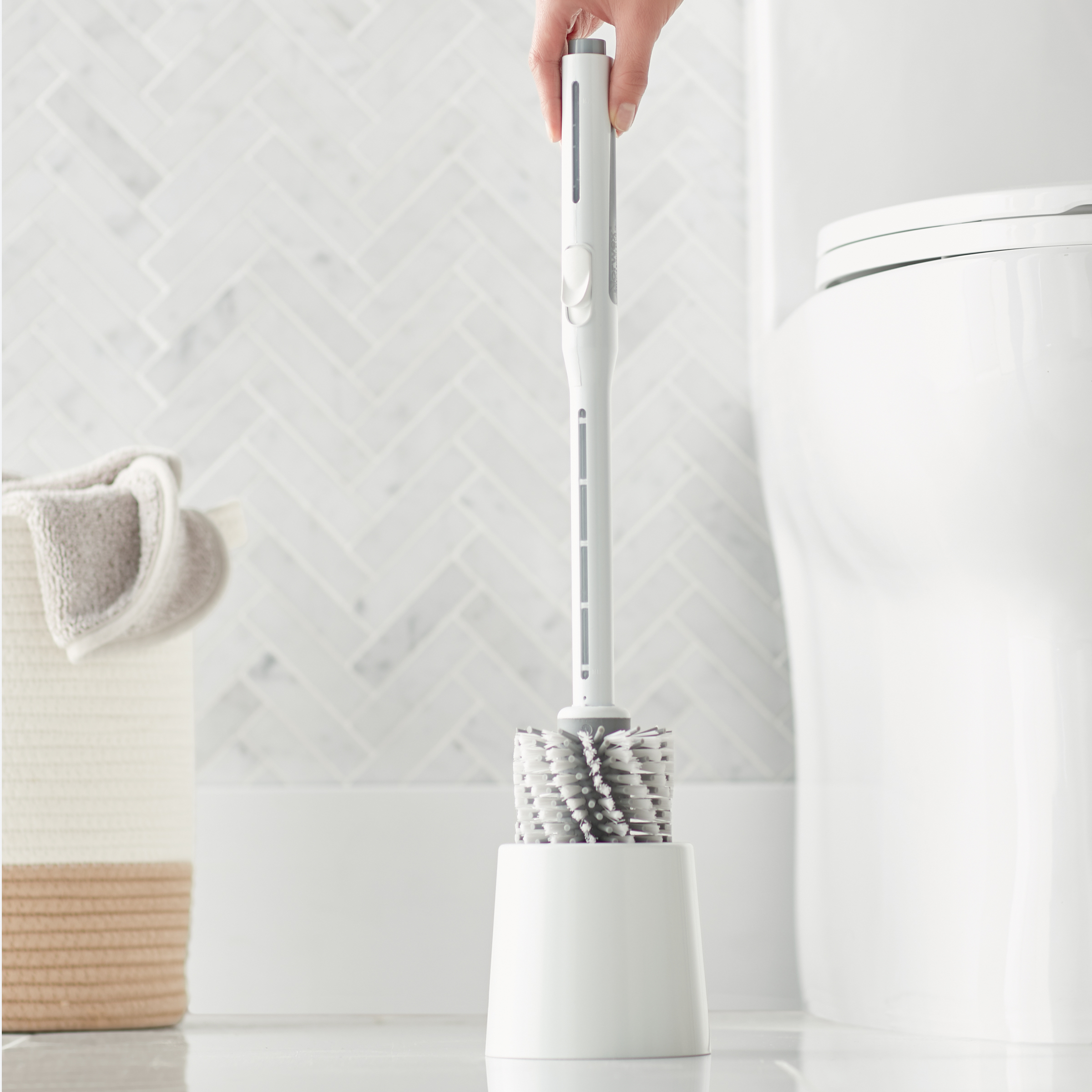 Cleaner dispensing toilet brush