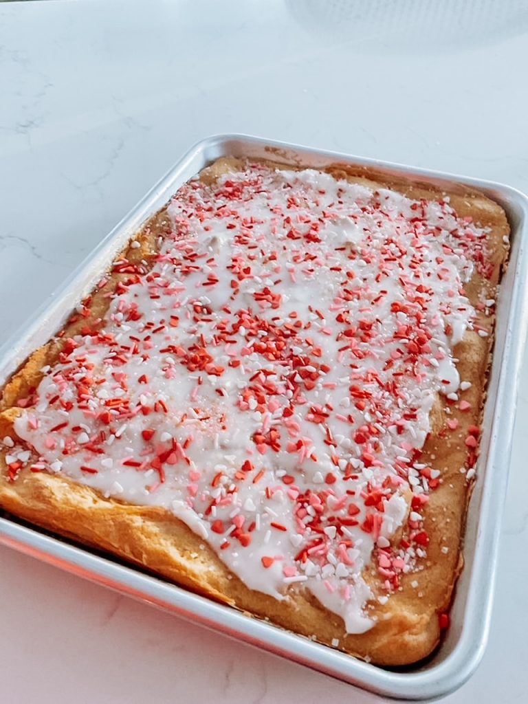 Valentines Day Kringle - spread glaze and add sprinkles